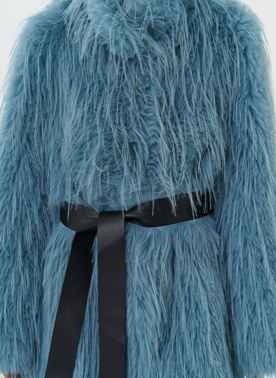 Женская шуба под эко страуса