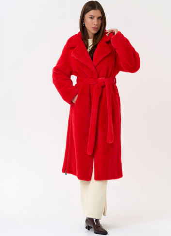 Женское пальто из эко меха с декоративными молниями